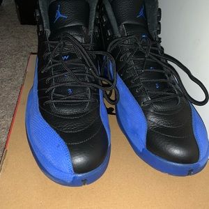 Size 14 Black Royal Jordan 12. Worn 5 times.